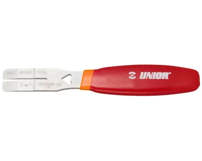 Распорка Unior Tools тормозных колодок + правка диска (красная)